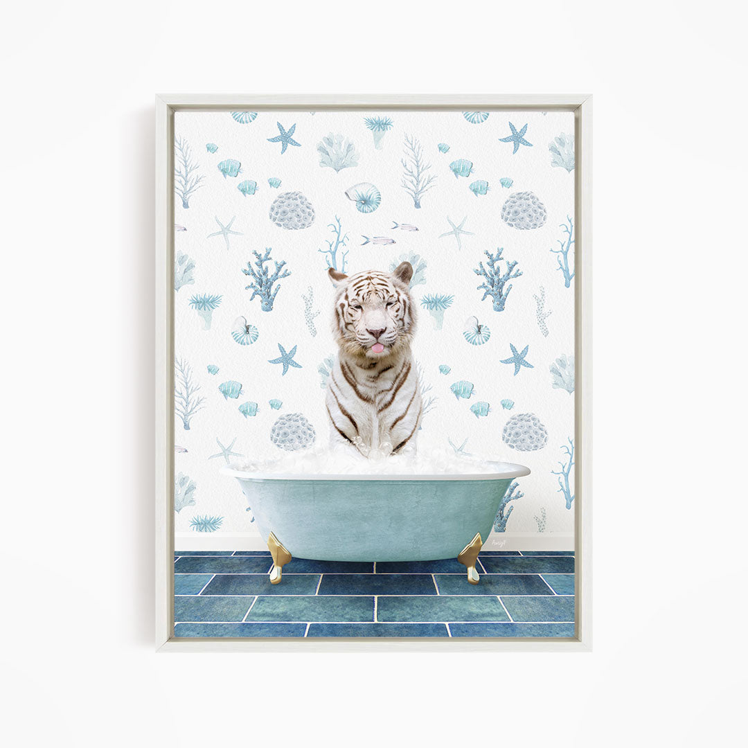 A white tiger is sitting in a blue bathtub, surrounded by a pattern of seashells, starfish, and other marine life.