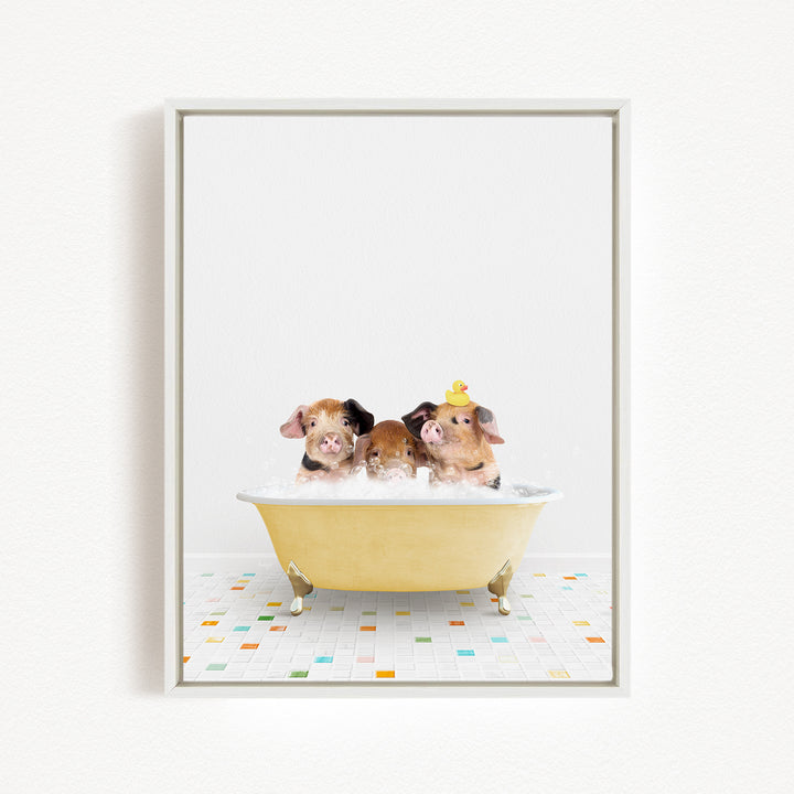 Three adorable pigs sitting in a yellow bathtub, with one of them wearing a yellow hat.