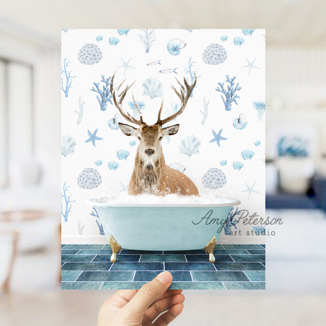 a hand holding up a card with a picture of a deer in a bathtub