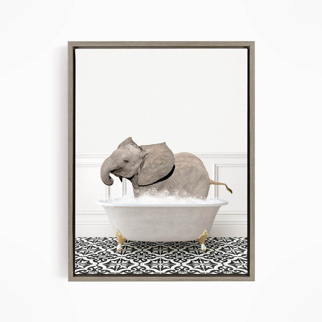 A baby elephant sitting in a bathtub filled with water, surrounded by a black and white patterned floor.