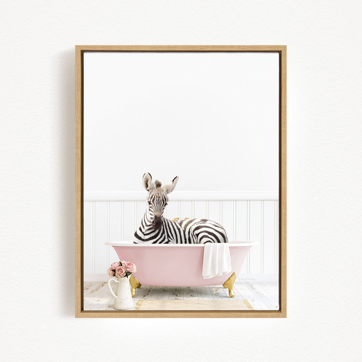 A zebra is sitting in a pink bathtub, surrounded by a white towel and pink flowers, creating a whimsical and playful scene.