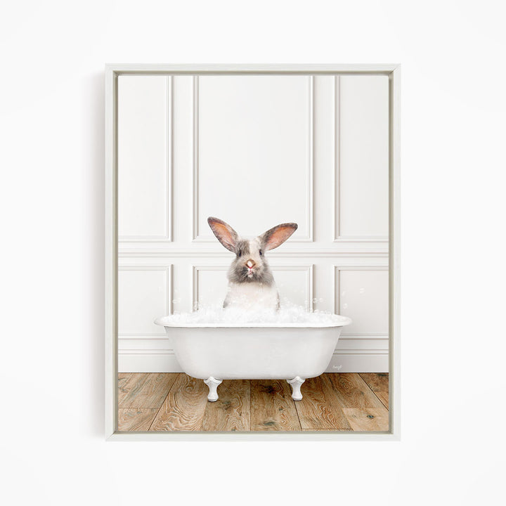A white rabbit sitting in a white bathtub filled with water, with its head above the water level.