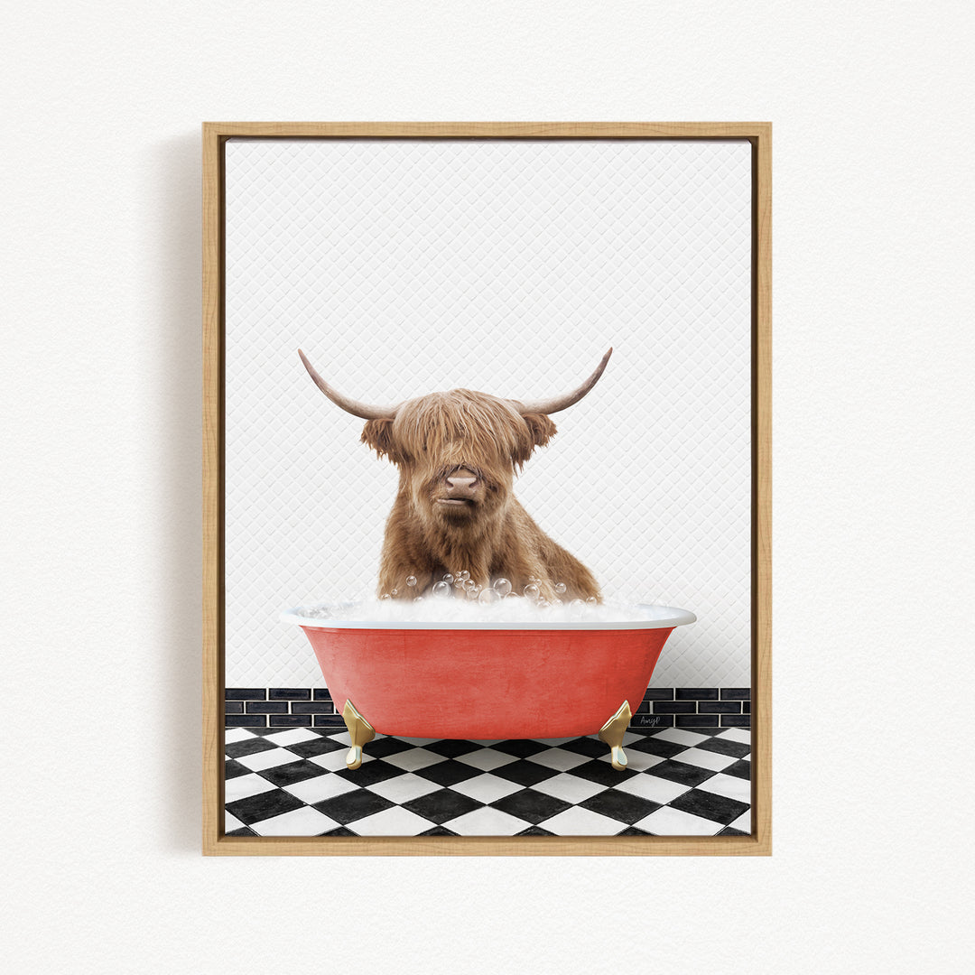 A Highland cow with shaggy brown hair is sitting in a red bathtub filled with water, creating a whimsical and playful scene.