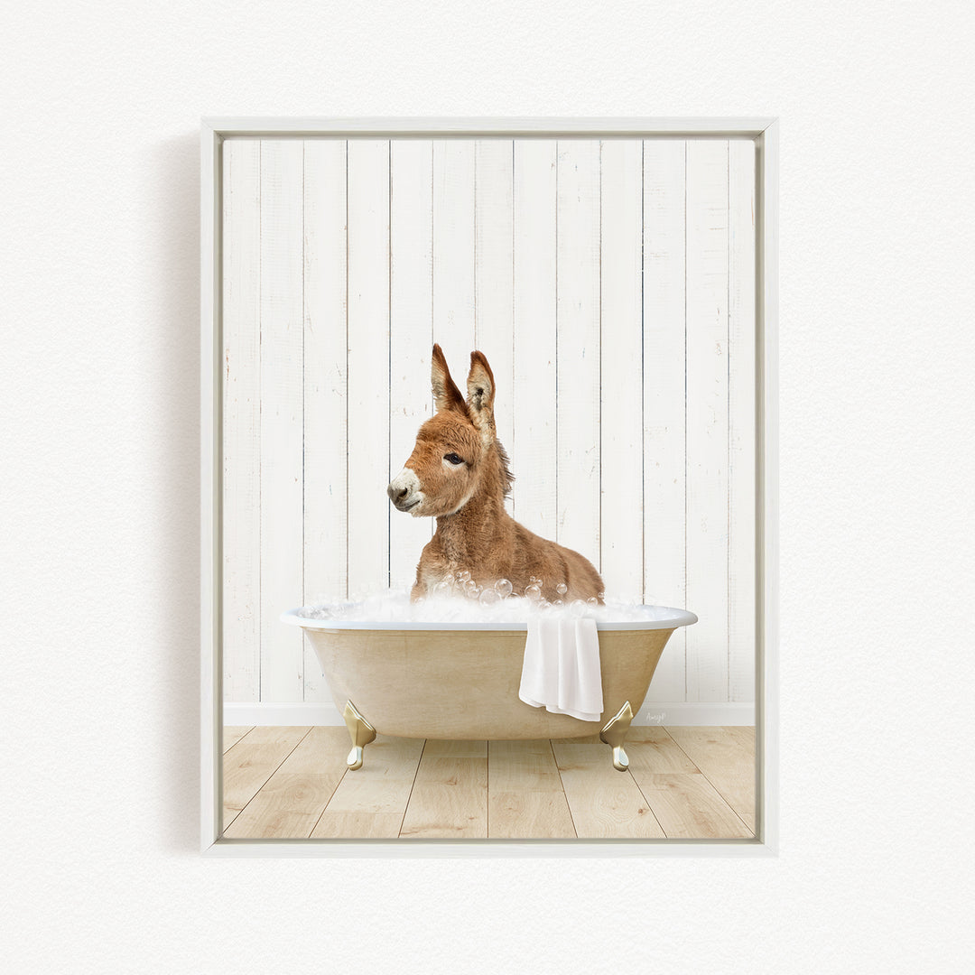 A donkey is sitting in a bathtub filled with water, creating a playful and whimsical scene.