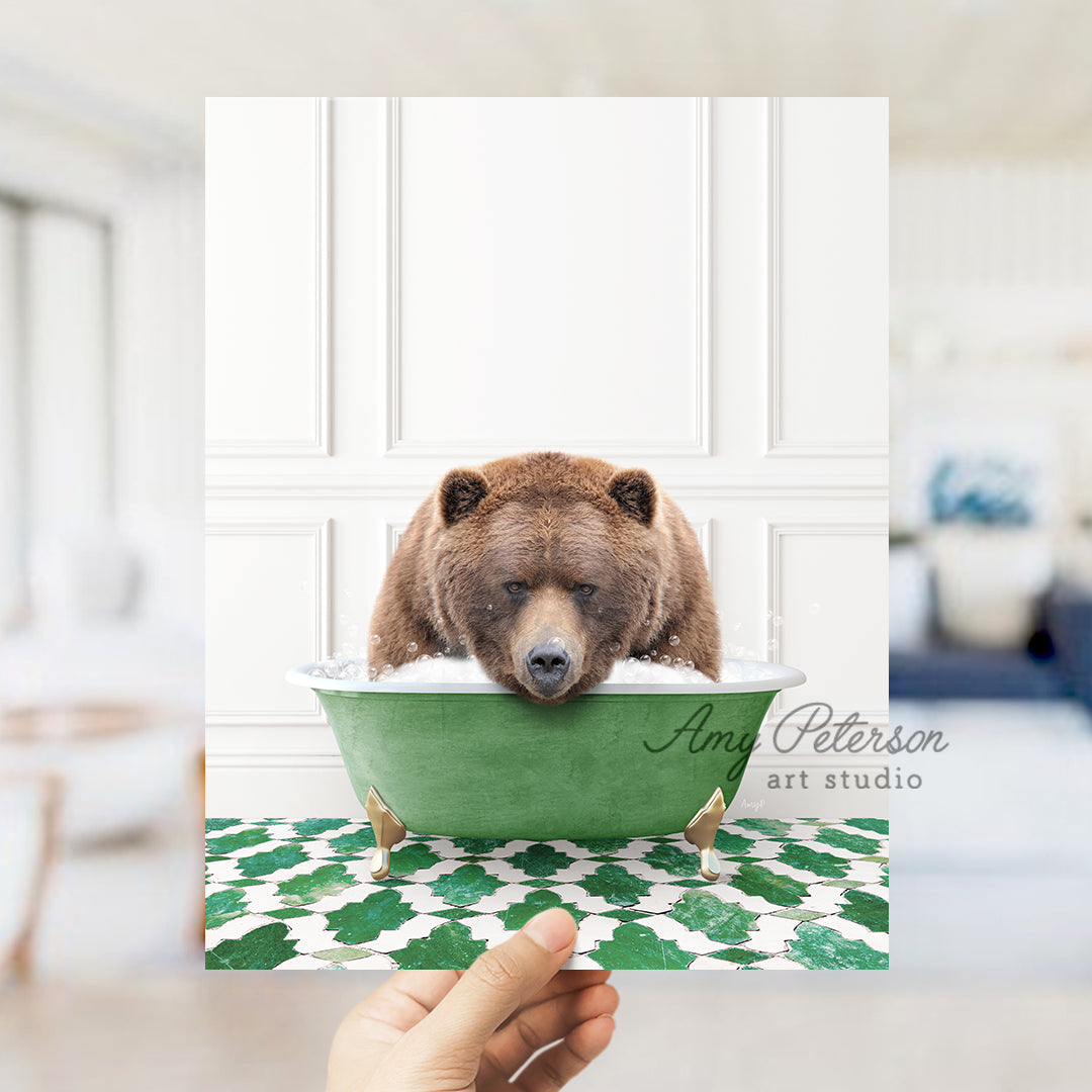 a brown bear sitting in a green bowl