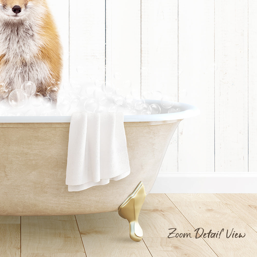 A dog is sitting in a bathtub filled with bubbles, with a towel and bathtub faucet visible.