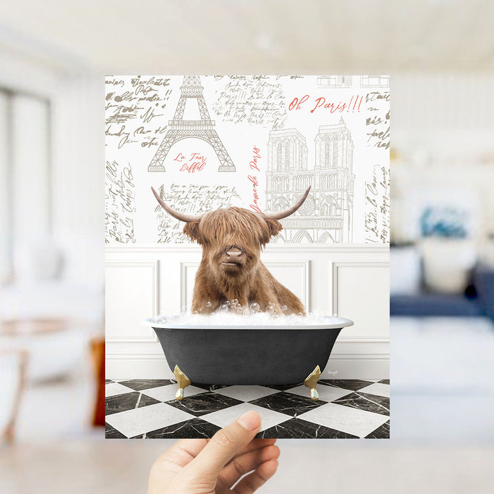 A brown cow with horns is sitting in a bathtub filled with water, surrounded by various Paris-themed elements such as the Eiffel Tower and other landmarks.