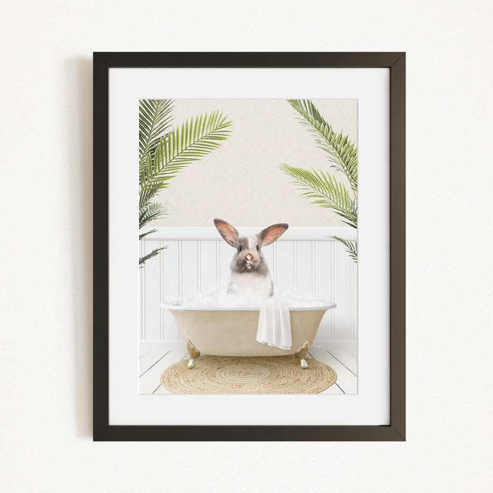 A white rabbit sitting in a bathtub filled with bubbles, surrounded by green palm leaves, creating a whimsical and relaxing scene.
