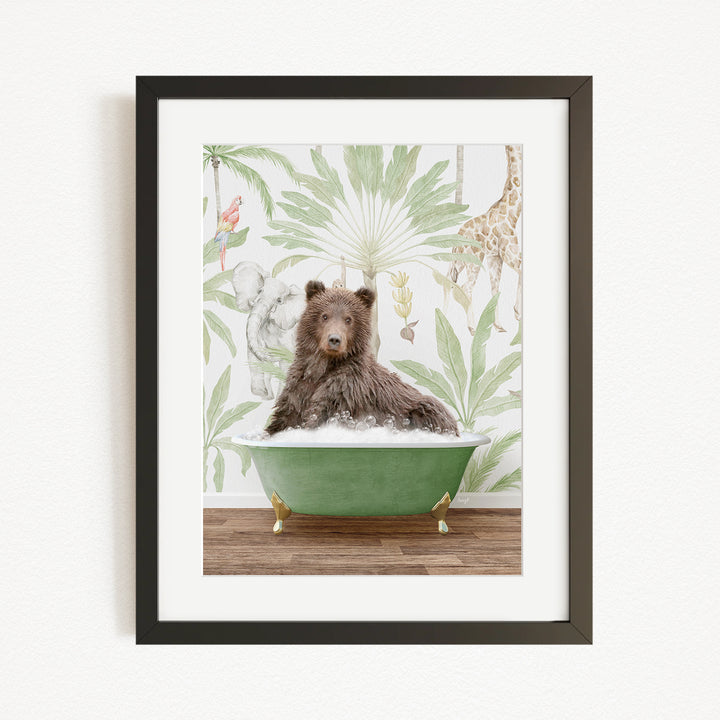 A brown bear is sitting in a green bathtub, surrounded by a tropical wallpaper with various animals, including a giraffe and an elephant.