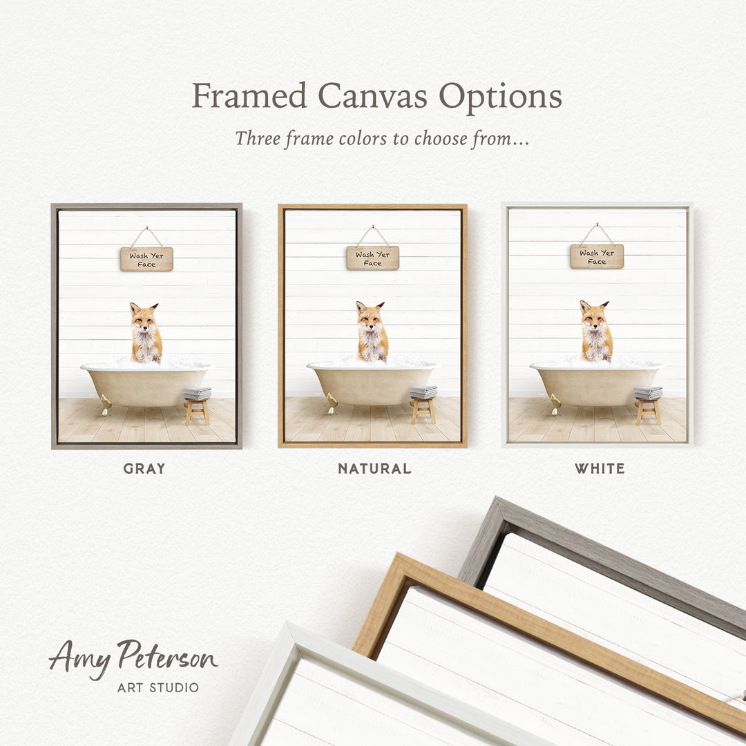 three framed canvas options featuring a fox sitting in a bathtub, with each option having a different frame color: gray, natural, and white.