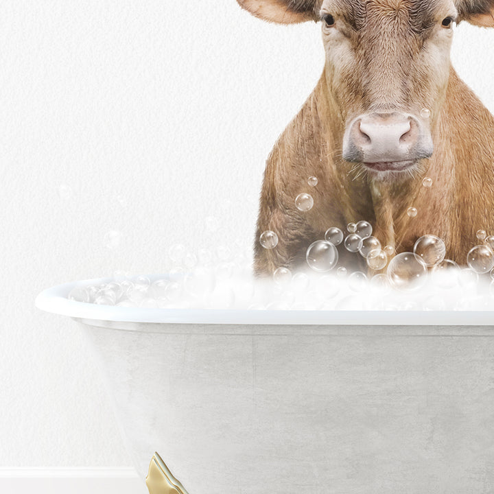 a cow is sitting in a bathtub with bubbles