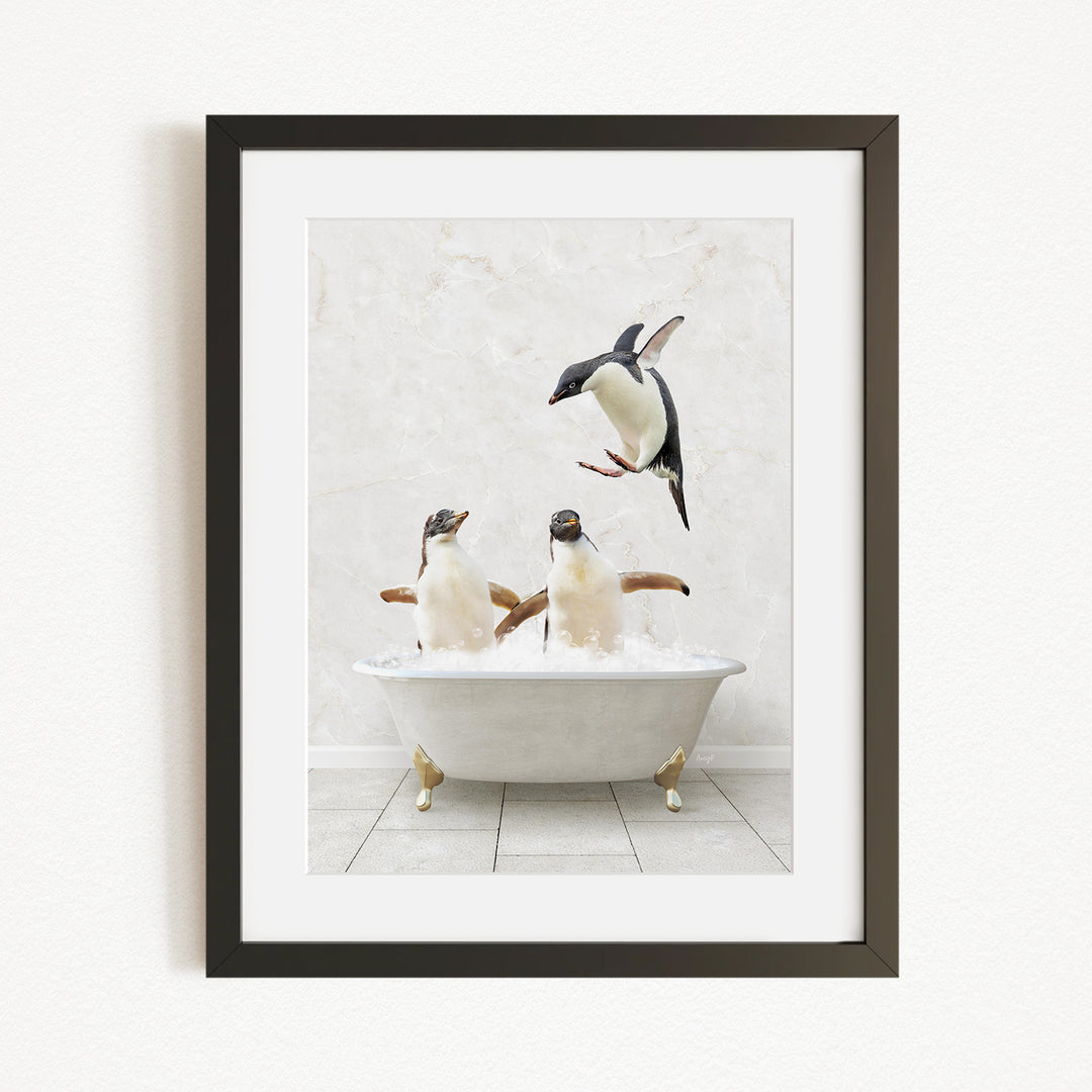 A framed image depicting two penguins sitting in a bathtub, with one penguin flying towards the other.
