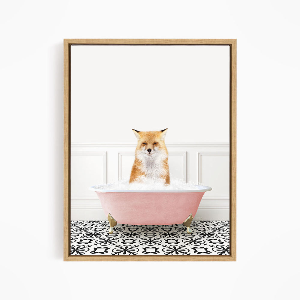 A red fox sitting in a pink bathtub filled with bubbles, with a black and white patterned floor in the background.