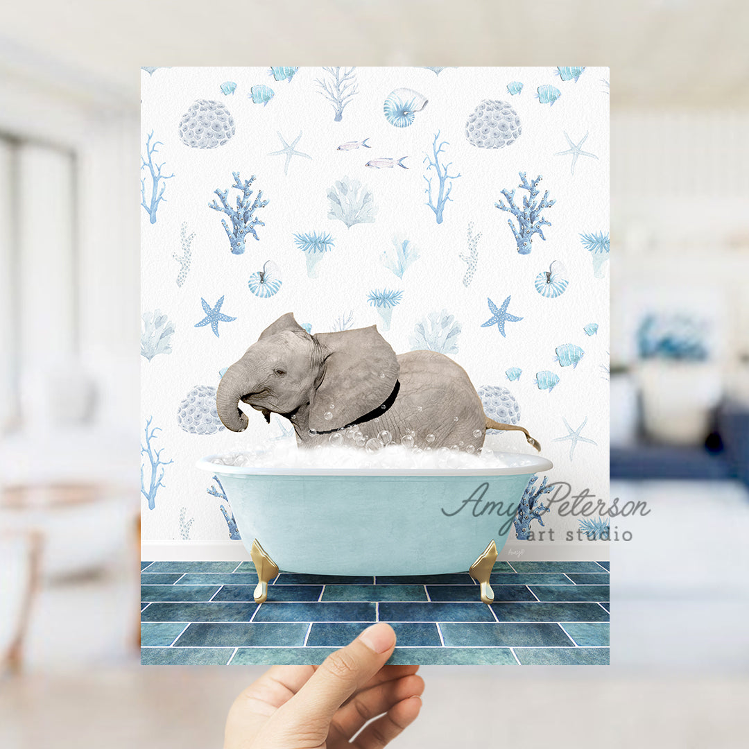 a hand holding up a card with an elephant in a bathtub