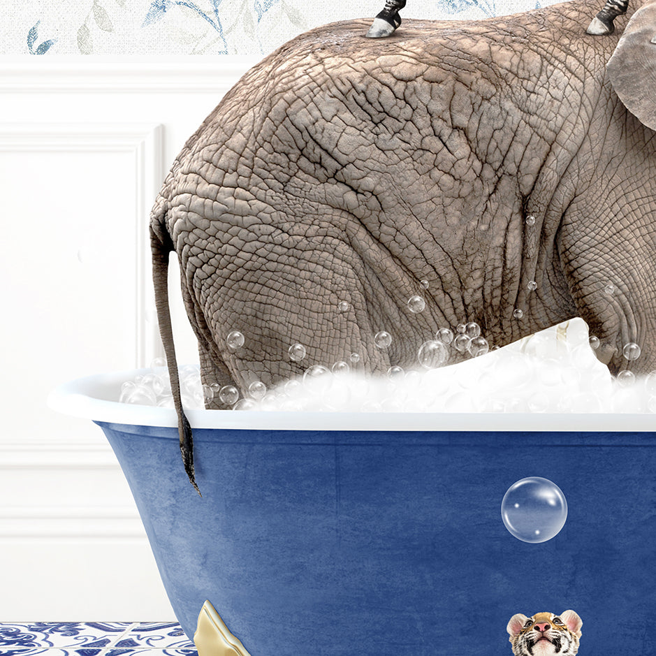 an elephant is taking a bath in a blue tub