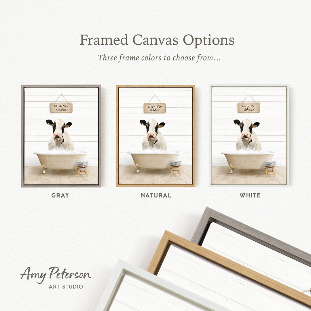 three framed canvas options featuring a cow in a bathtub, each with a different frame color: gray, natural, and white.