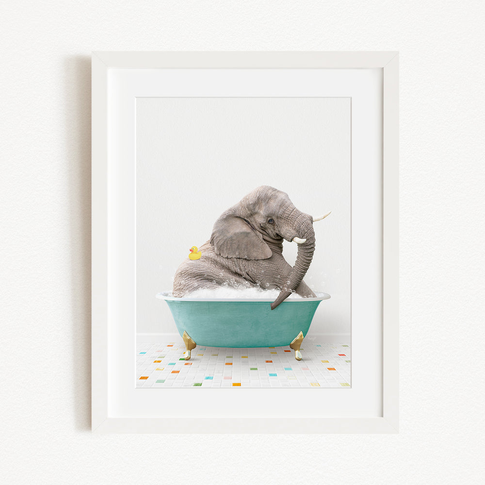 A gray elephant is sitting in a green bathtub filled with bubbles, surrounded by small yellow birds.