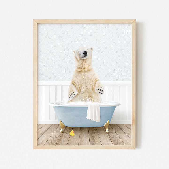 a polar bear sitting in a blue bath tub