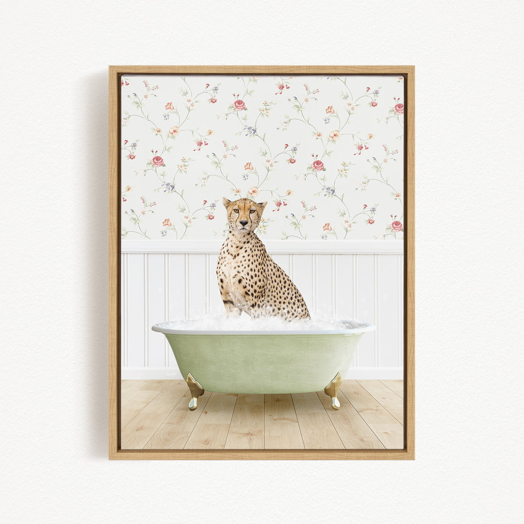 A cheetah sitting in a green bathtub filled with water, with a floral wallpaper in the background.