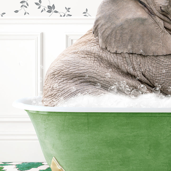 an elephant sitting in a bathtub with foam