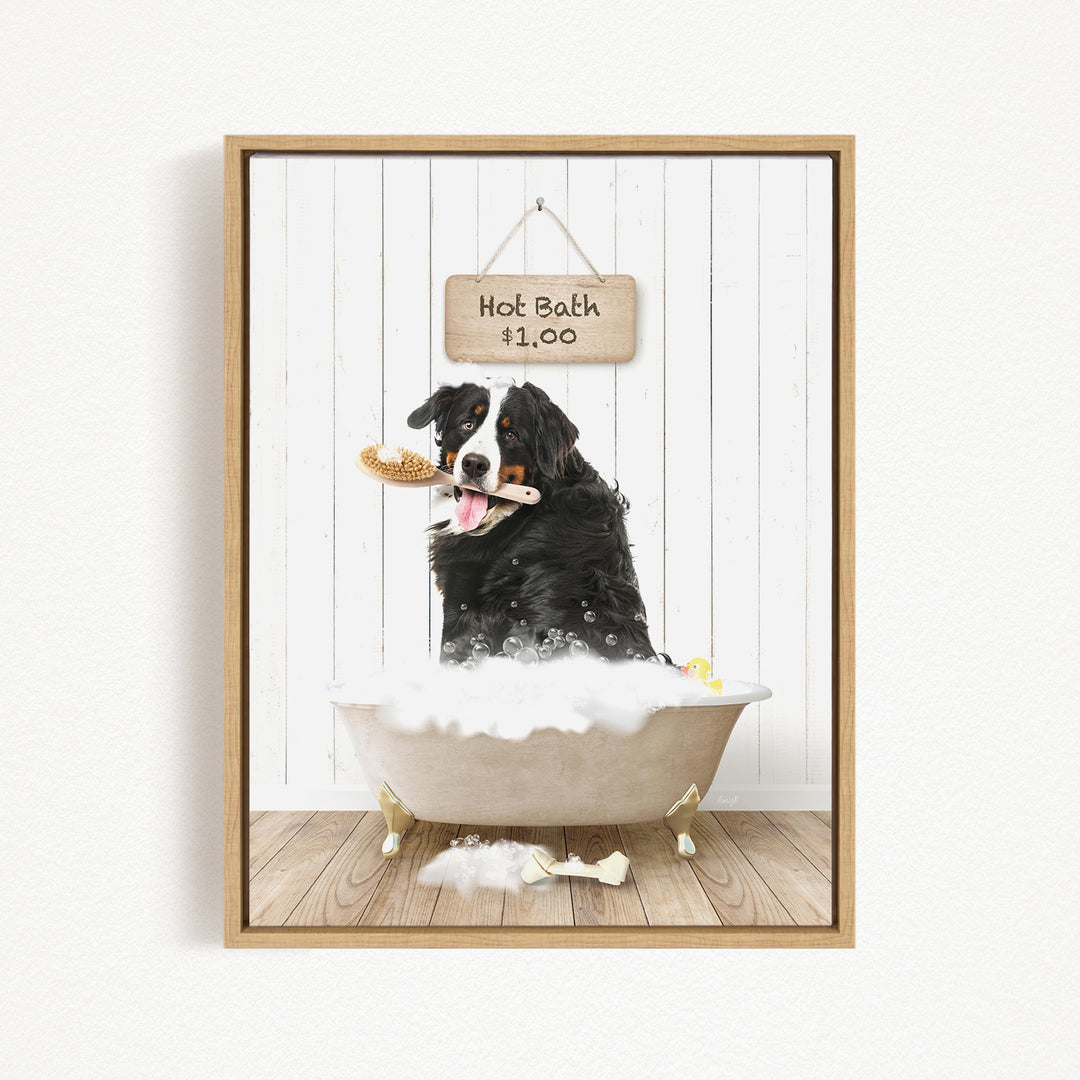 A black and white dog is sitting in a white bathtub filled with bubbles, holding a toy in its mouth, and there is a sign above the bathtub that says "Hot Bath $1.00".