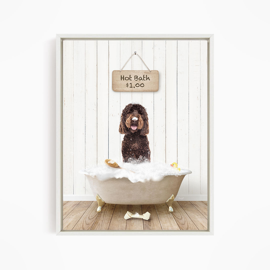 A brown dog sitting in a white bathtub filled with bubbles, with a sign above the tub indicating a hot bath for $1.00.
