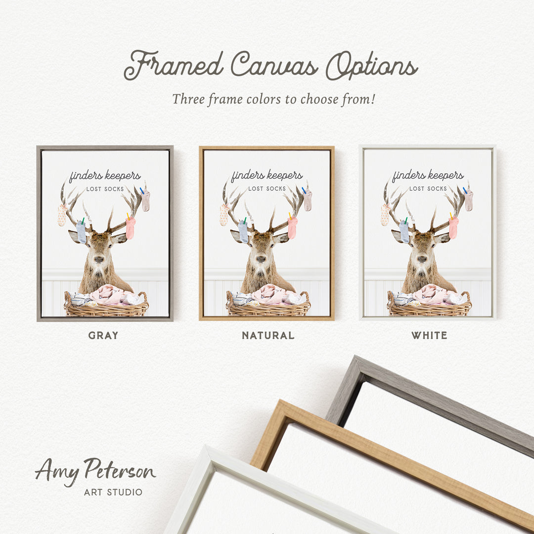 three framed canvas options, each featuring a deer with antlers and a basket of socks. The options include a gray frame, a natural frame, and a white frame.