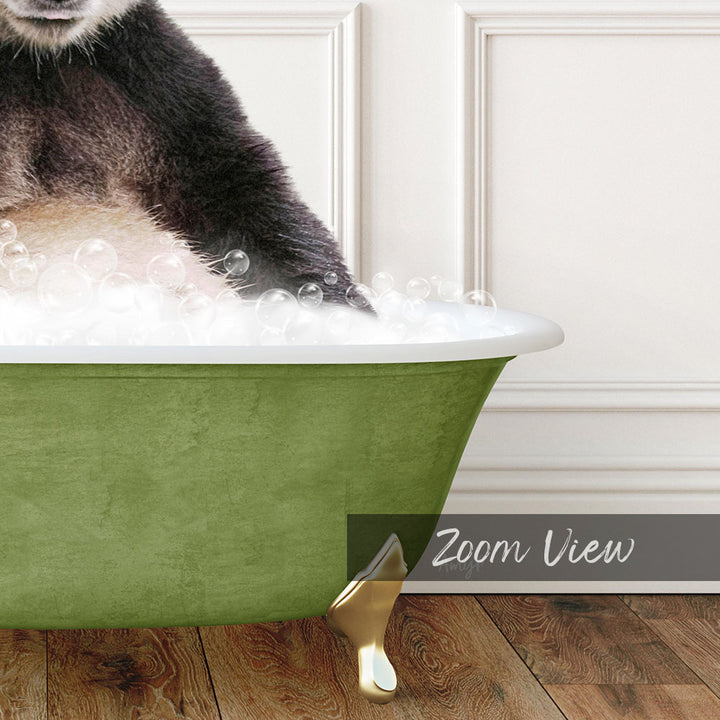 A cat sitting in a green bathtub filled with bubbles, with a wooden floor visible in the background.