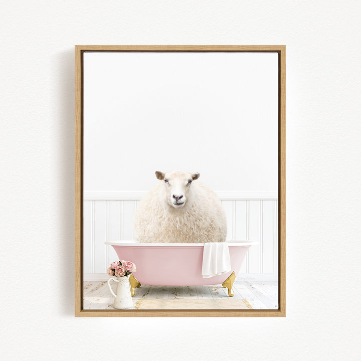 A fluffy white sheep sits in a pink bathtub, surrounded by a vase of flowers and a white towel, creating a whimsical and charming scene.