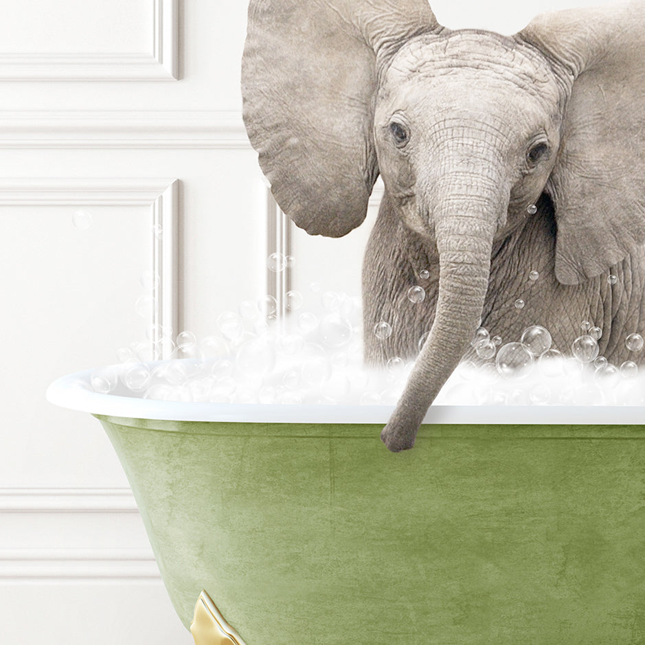 a baby elephant is taking a bath in a bathtub