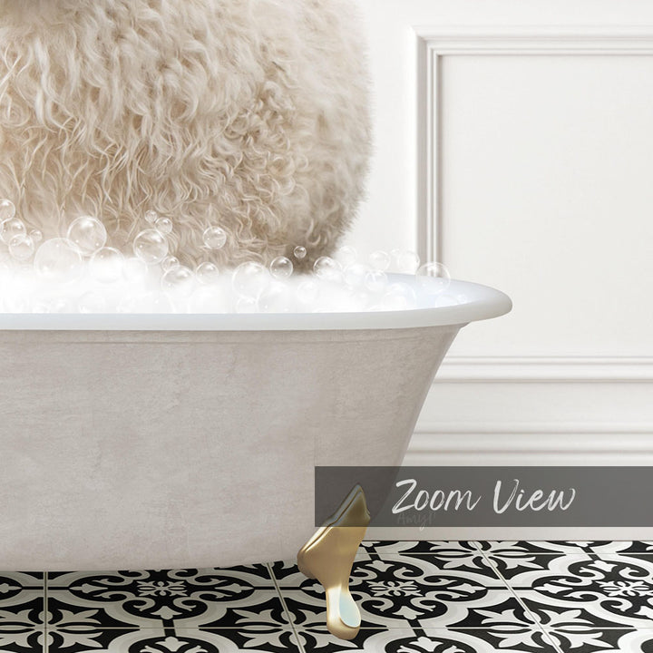 A fluffy white dog is standing in a bathtub filled with bubbles, with a black and white patterned floor in the foreground.