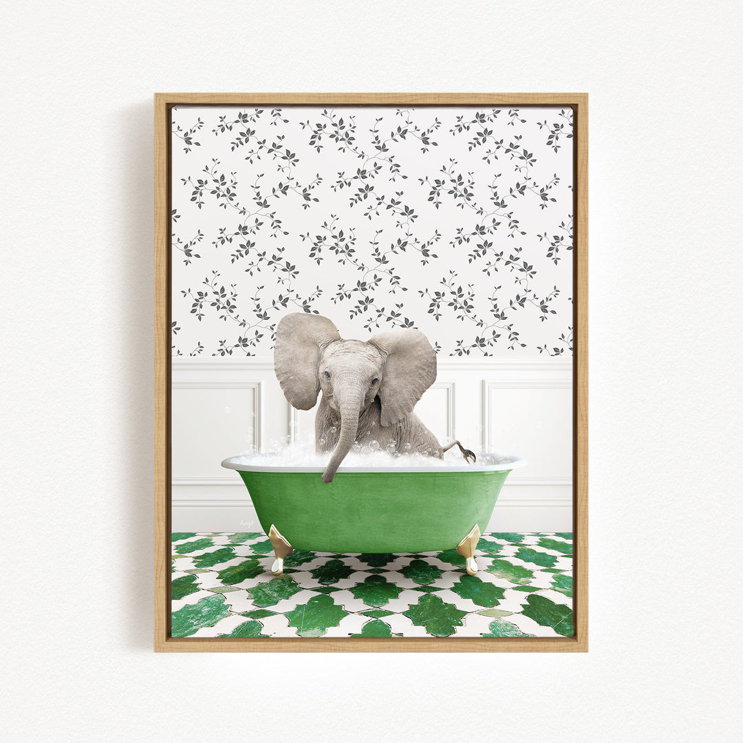 A gray elephant is sitting in a green bathtub filled with water, surrounded by a patterned wall and green and white tiles on the floor.