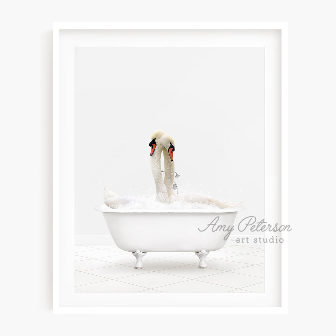 two swans in a bathtub with bubbles of water