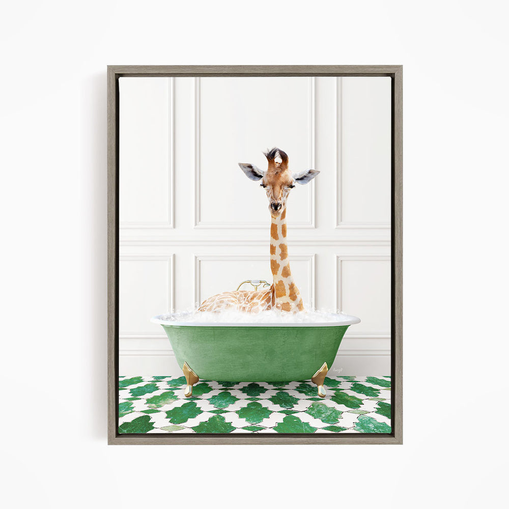 A giraffe sitting in a green bathtub filled with bubbles, surrounded by a green and white patterned floor.