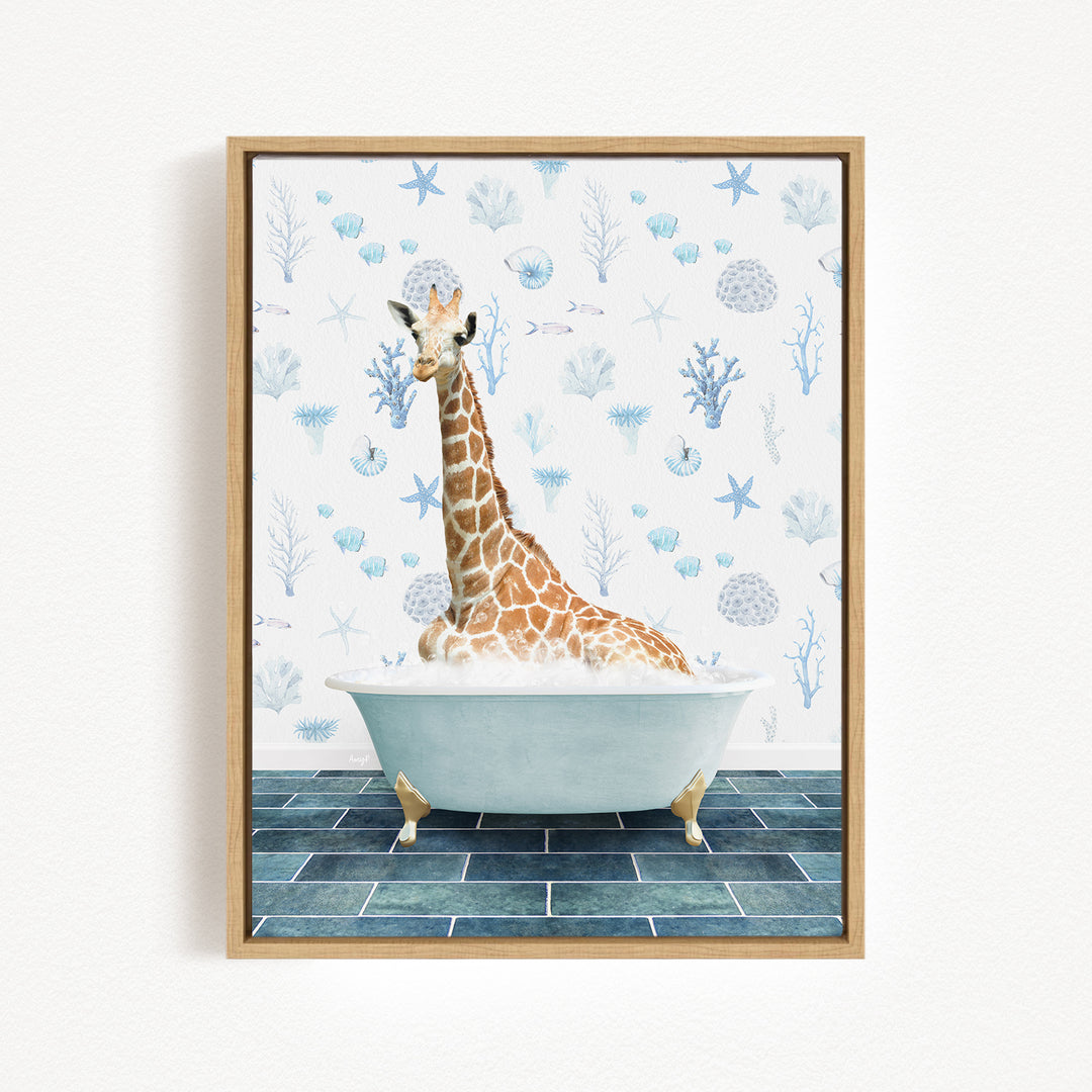 A giraffe sitting in a bathtub filled with water, surrounded by blue and white floral patterns on the wall behind it.