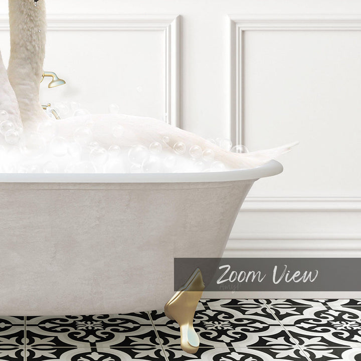 A white bathtub filled with bubbles, with a gold faucet and a swan-like figure standing in the water.