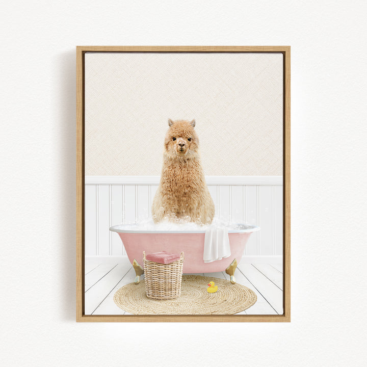A fluffy brown dog sitting in a pink bathtub filled with bubbles, surrounded by a basket of bath toys and a yellow rubber duck.