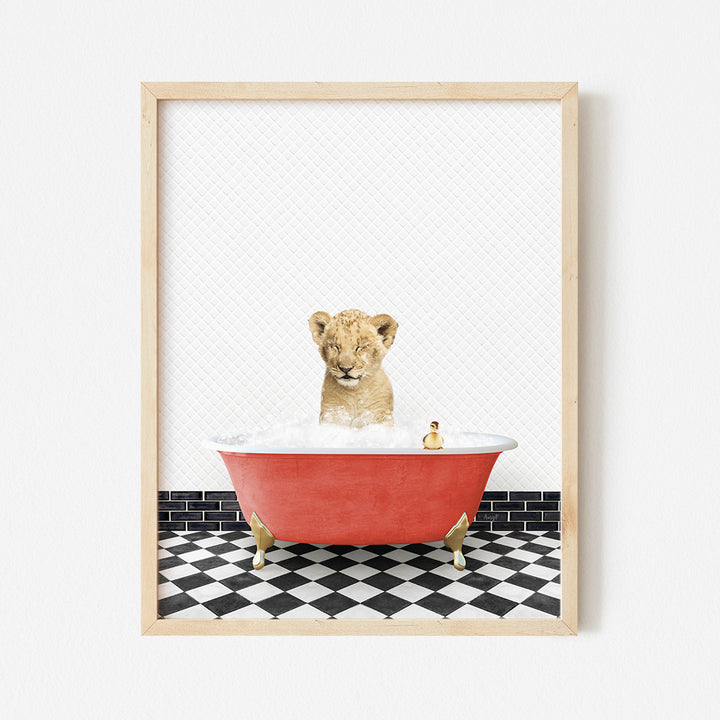 a picture of a lion cub in a bathtub