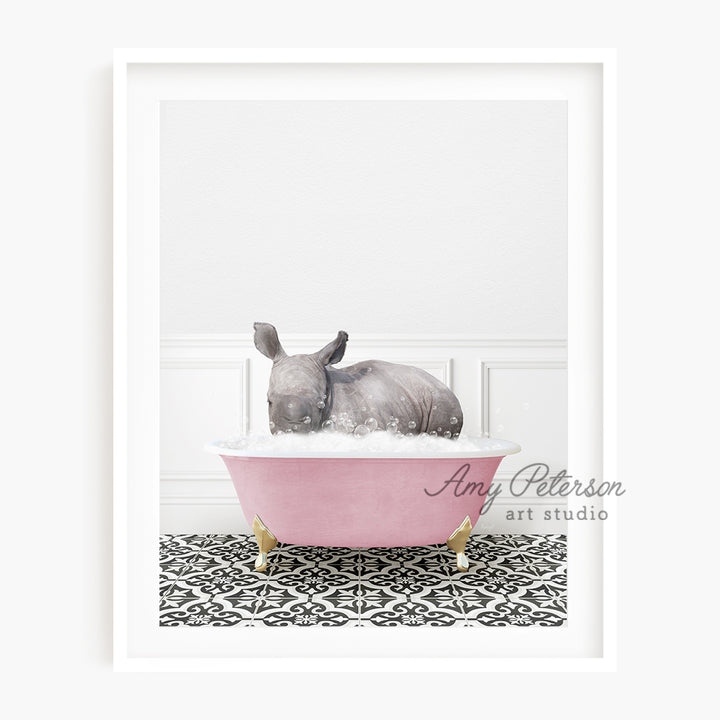 a rhino in a pink bathtub with a black and white tile floor