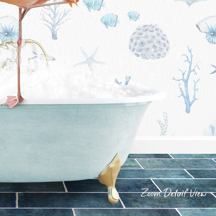 A bathtub filled with water and surrounded by a wall decorated with various marine life, including starfish, fish, and coral.
