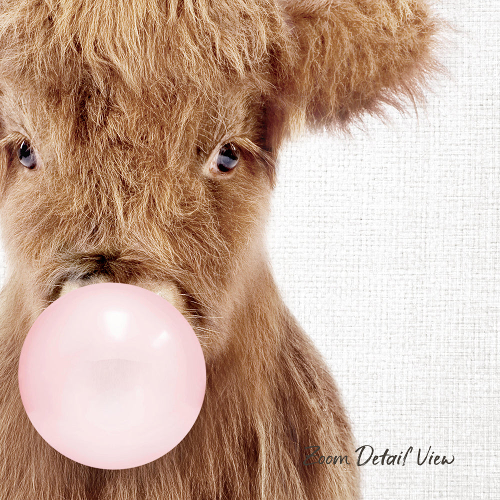 A close-up of a brown cow blowing a pink bubble with its mouth, creating a playful and whimsical scene.