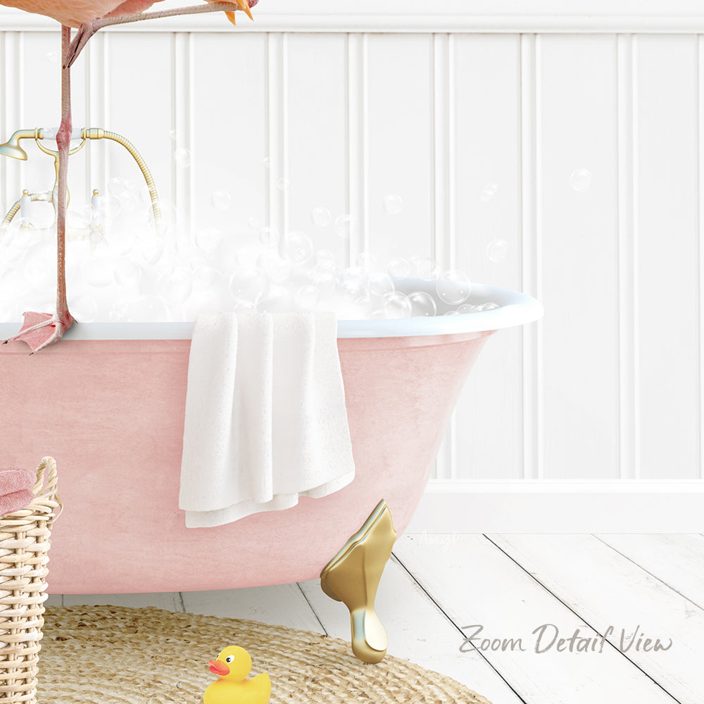 A pink claw-foot bathtub filled with bubbles, with a towel hanging on the side and a rubber duck nearby.