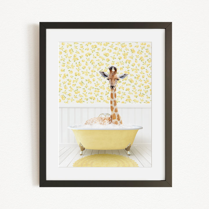 A giraffe is sitting in a yellow bathtub filled with bubbles, surrounded by a yellow floral wallpaper.
