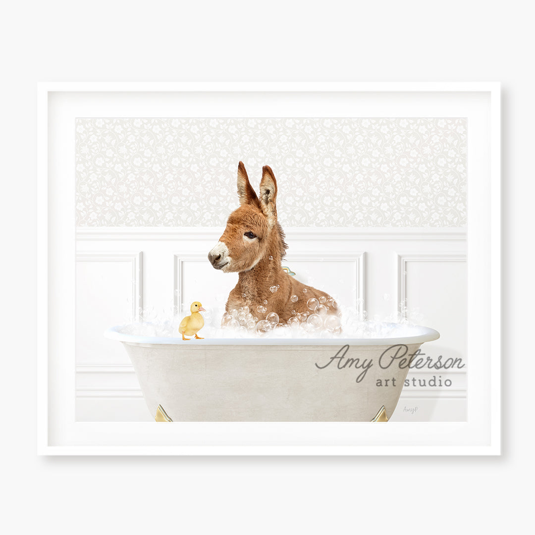 a dog sitting in a bathtub with a rubber duck