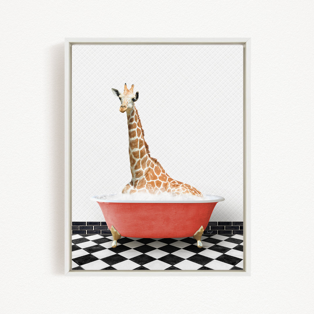 A giraffe sitting in a red bathtub on a black and white checkered floor.