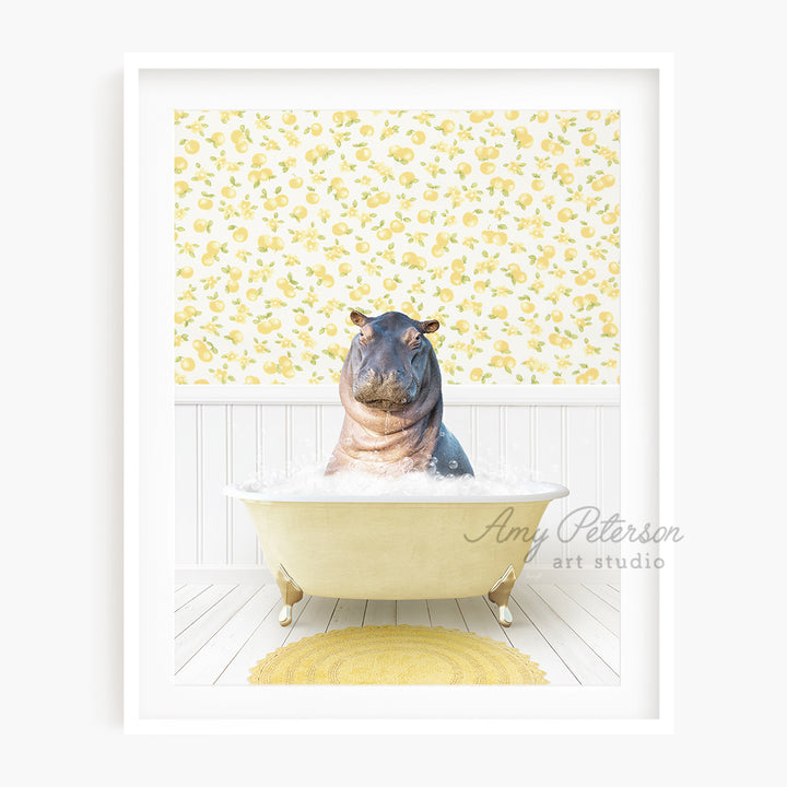 a hippo sitting in a bathtub with a yellow rug