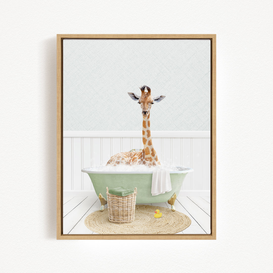 A giraffe sitting in a green bathtub filled with bubbles, surrounded by a basket of toys and a yellow rubber duck.