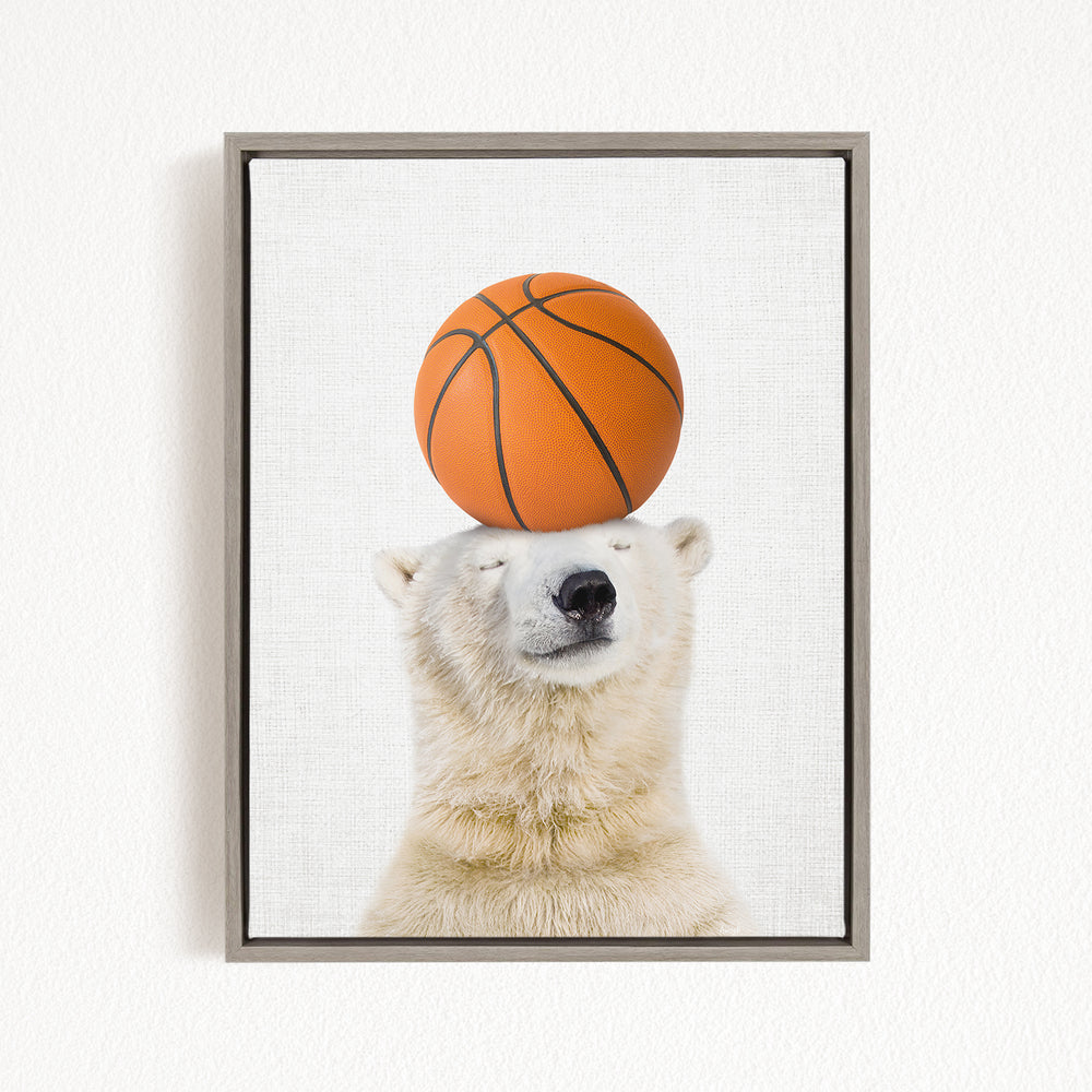 A polar bear balancing a basketball on its head.