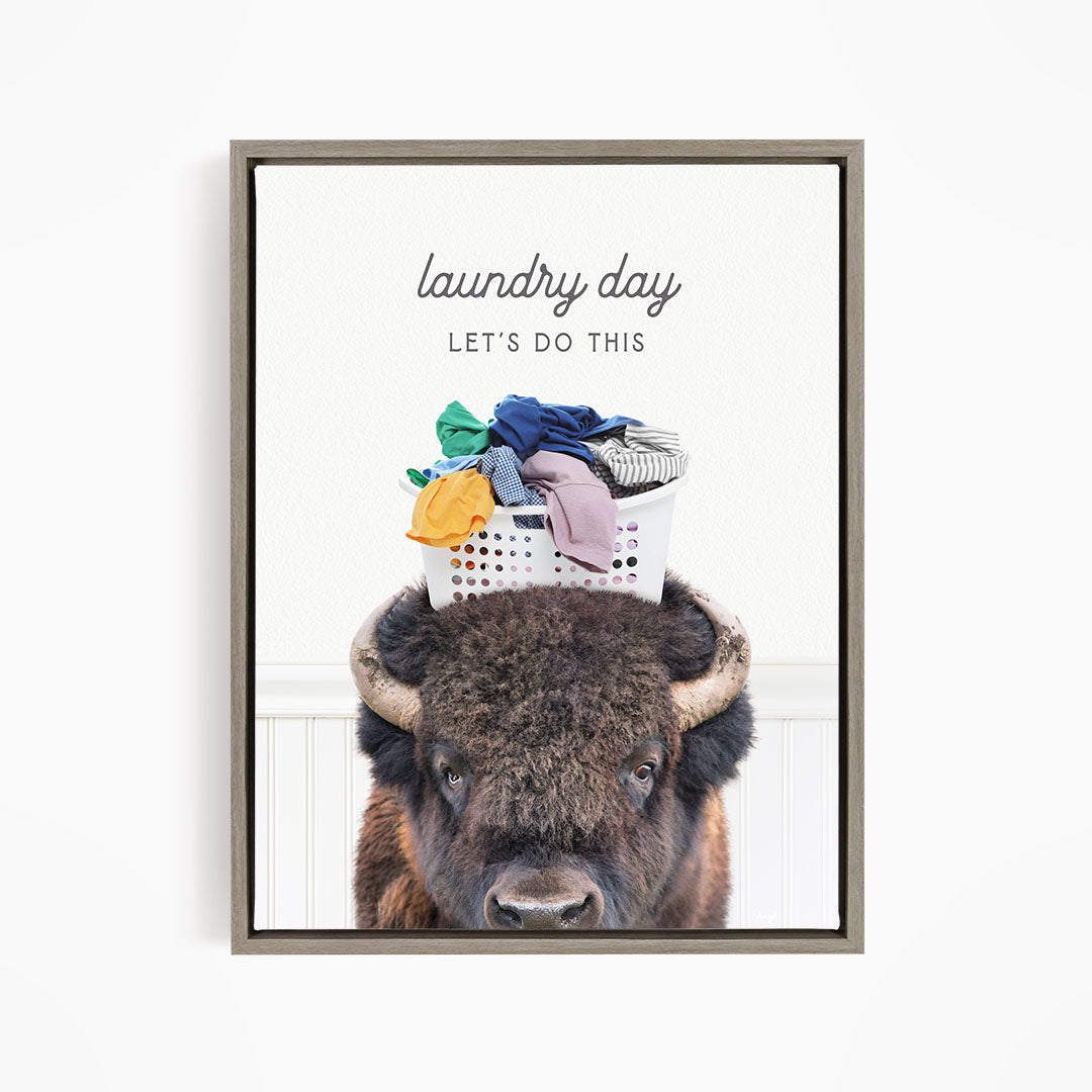 A buffalo with a laundry basket on its head, accompanied by the text "laundry day let's do this".