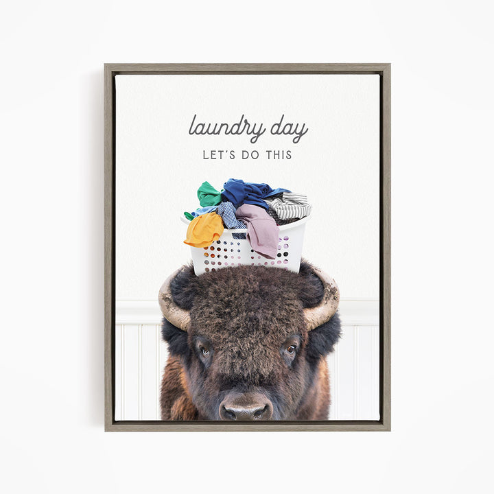 A buffalo with a laundry basket on its head, accompanied by the text "laundry day let's do this".